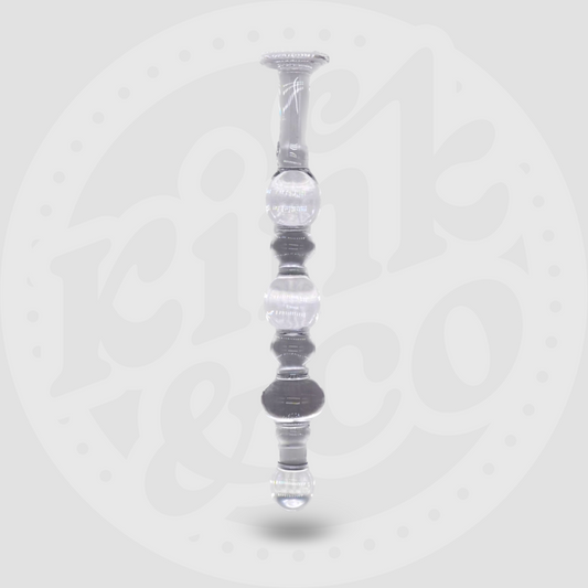 Glass rod sex toy with varying size bobbles running down the shaft and a flat base handle. On a grey background of the Kink&Co logo