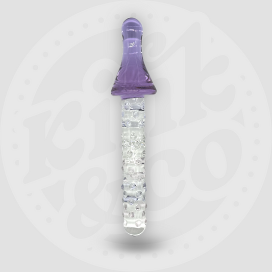 Consolador de cristal de gran tamaño con forma de varita de fantasía y mango morado