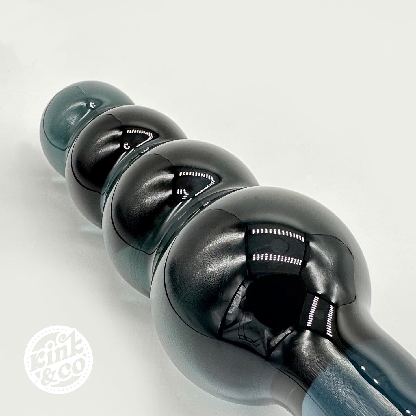 Beaded sensual black glass dildo / butt plug by Kink&Co